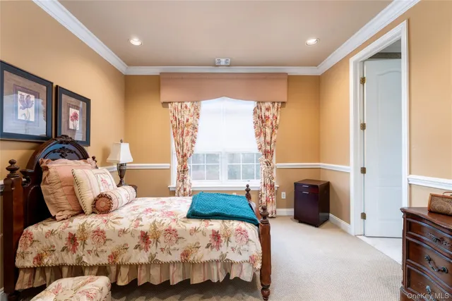a bathroom with a tub a sink and a large mirror