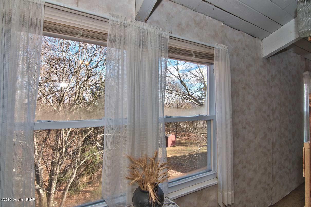 180 Hummingbird Trail Bushkill, PA 18324 - Photo 47 of 85 Enclosed Balcony