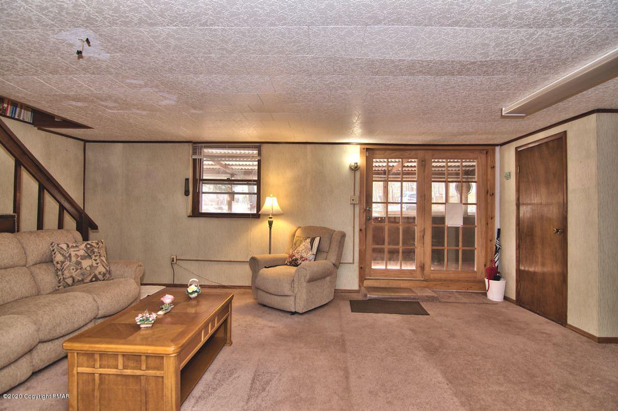 180 Hummingbird Trail Bushkill, PA 18324 - Photo 49 of 85 Lower Level Family Room