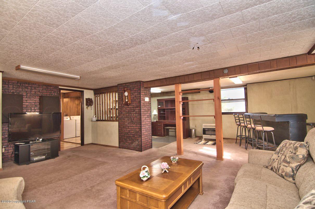 180 Hummingbird Trail Bushkill, PA 18324 - Photo 52 of 85 Lower Level Family Room
