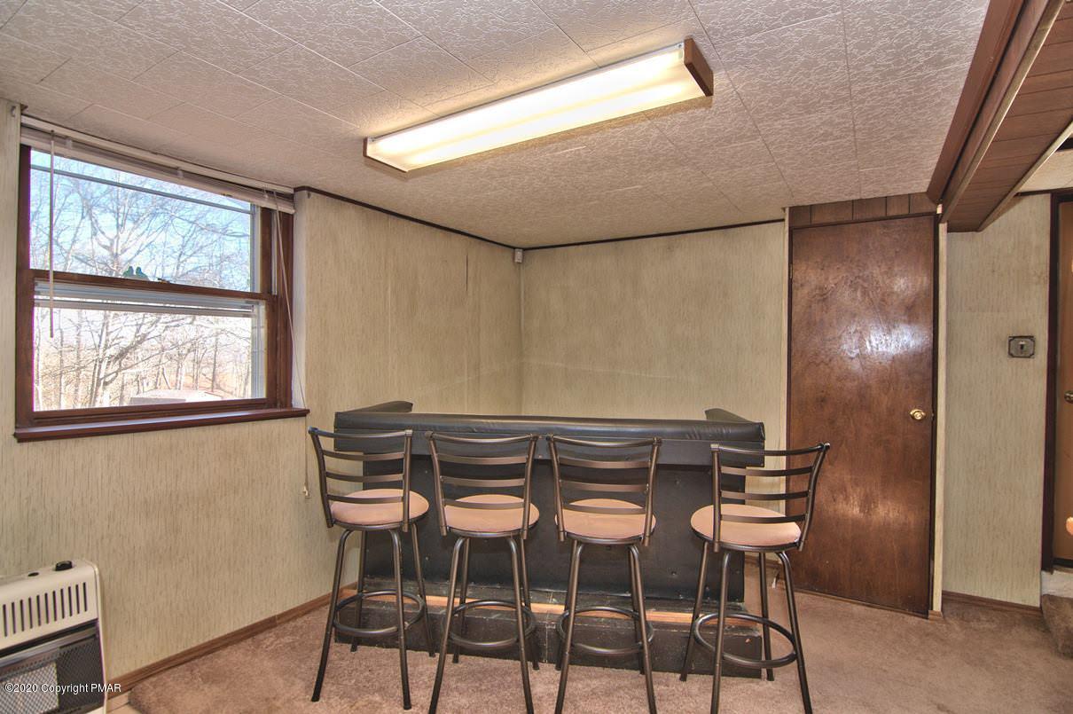 180 Hummingbird Trail Bushkill, PA 18324 - Photo 53 of 85 Lower Level Bar