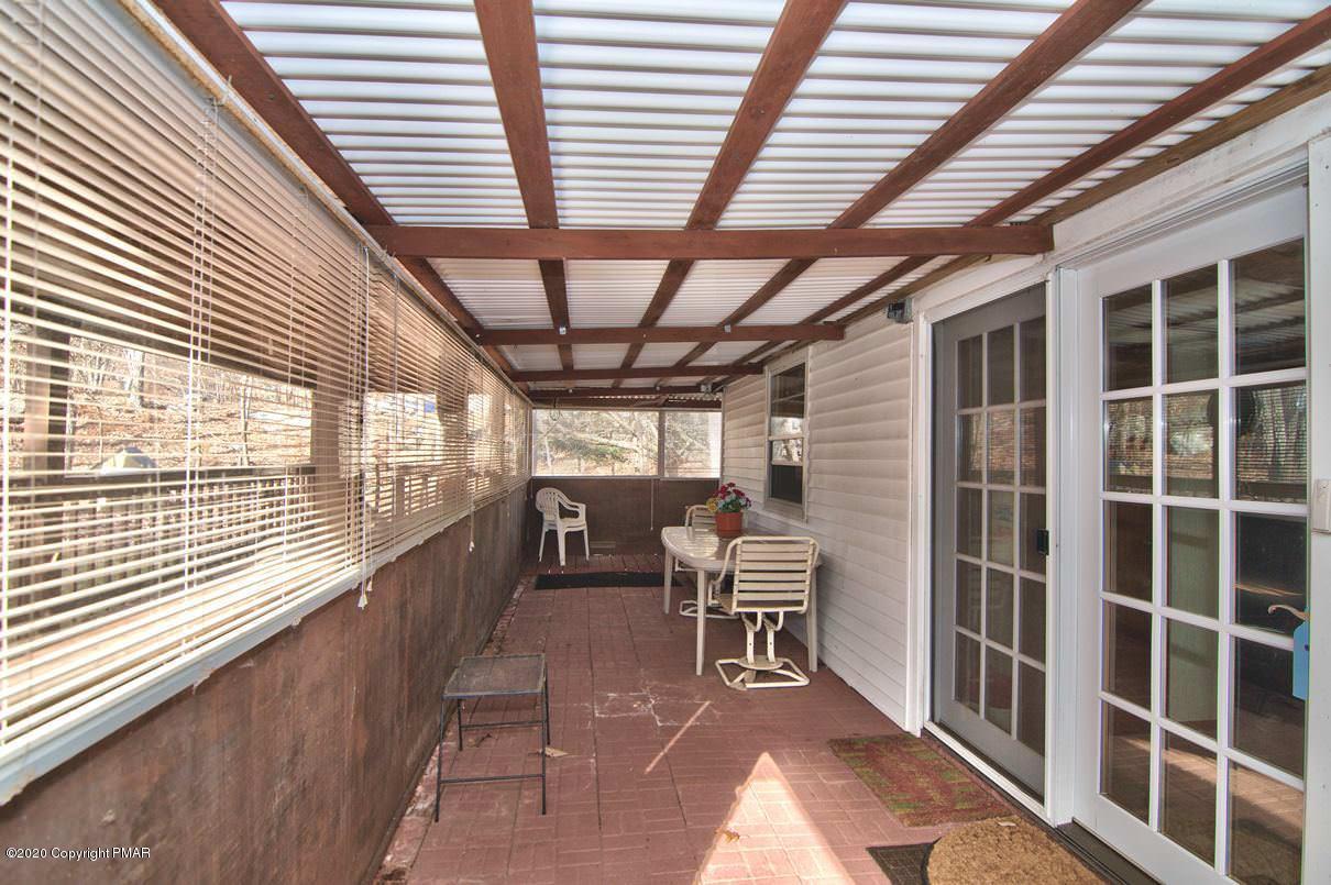 180 Hummingbird Trail Bushkill, PA 18324 - Photo 65 of 85 Patio Lower Level
