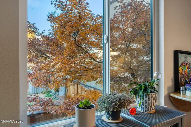 a kitchen with stainless steel appliances a stove a sink and a refrigerator