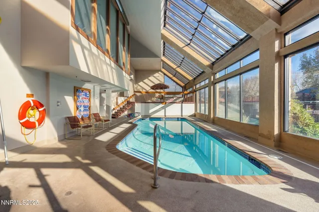 a view of swimming pool with a yard