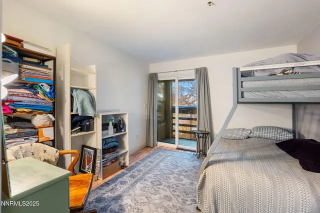a view of a livingroom with furniture and a flat screen tv