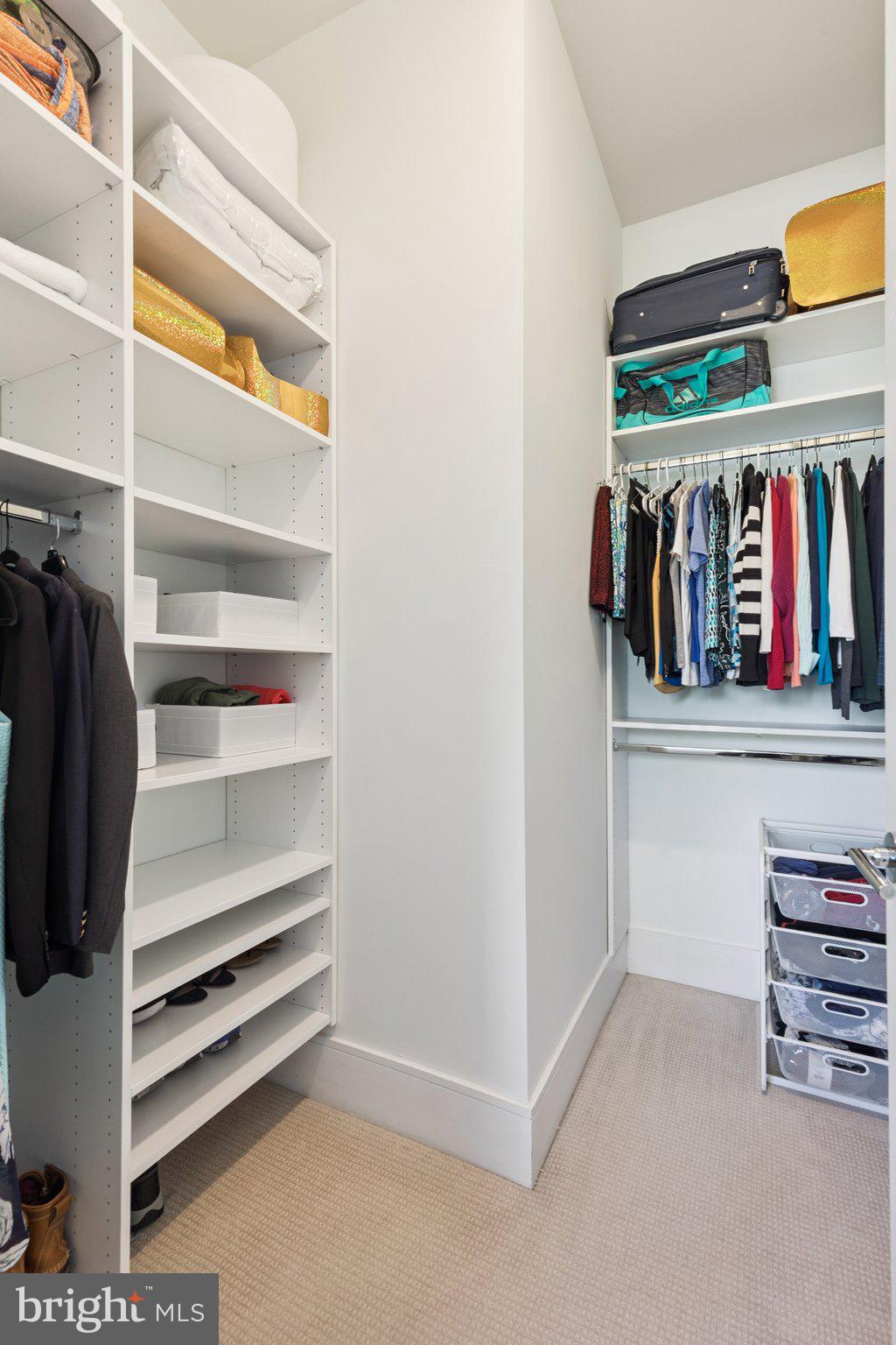 410 South Front Street, Unit 108 Philadelphia, PA 19147 - Photo 17 of 34 a view of walk in closet with clothes and shoes