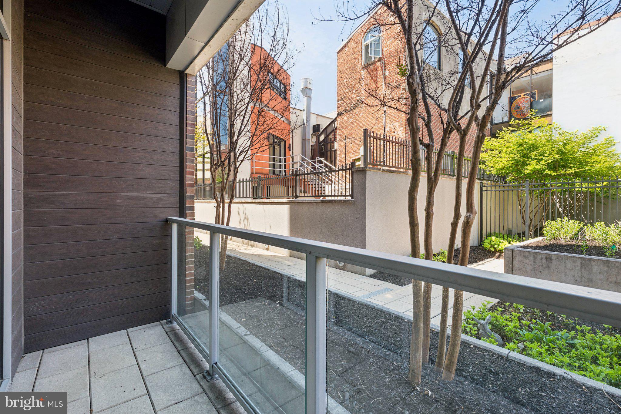 410 South Front Street, Unit 108 Philadelphia, PA 19147 - Photo 20 of 34 a view of balcony with two chairs and a table
