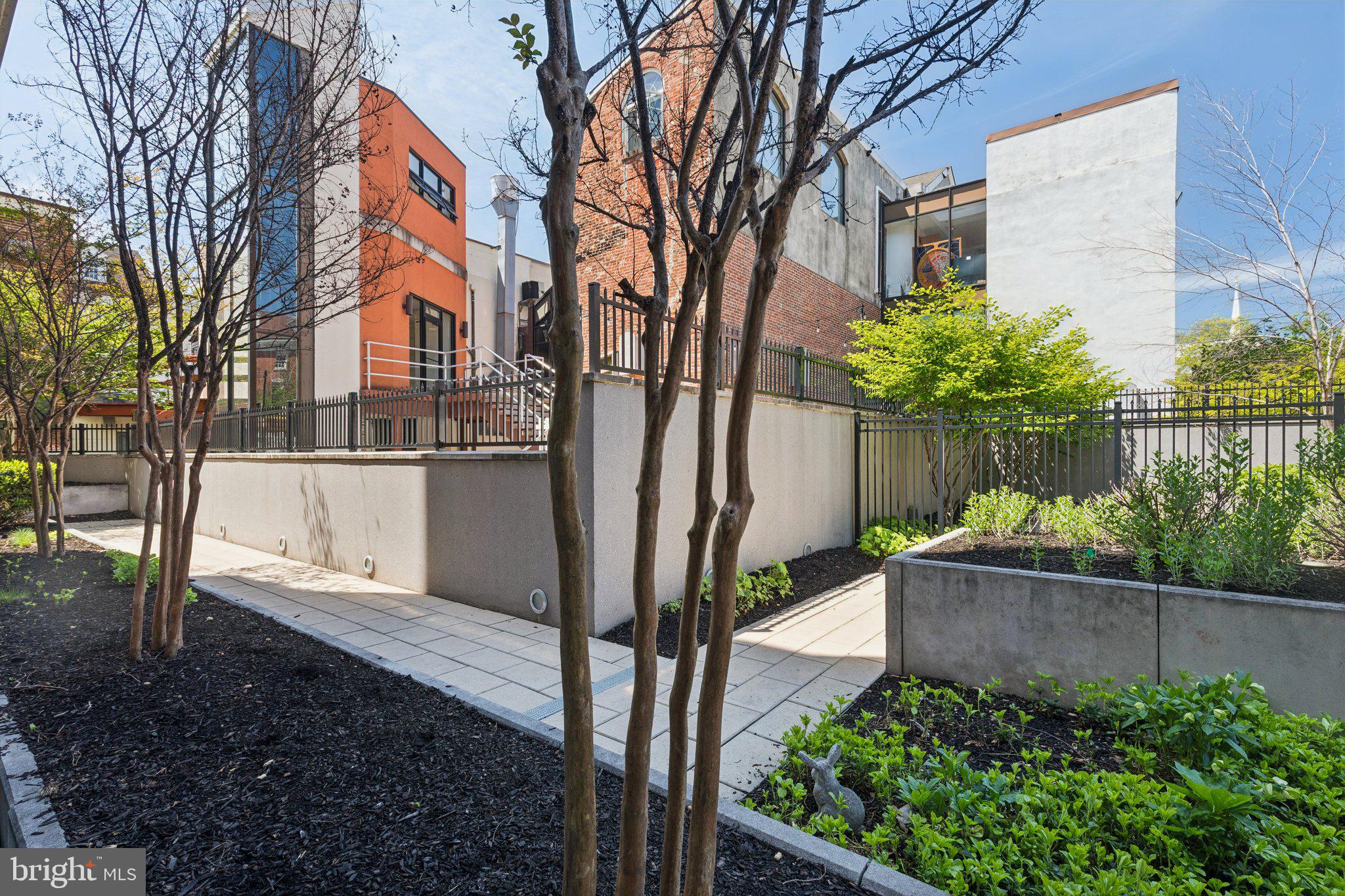 410 South Front Street, Unit 108 Philadelphia, PA 19147 - Photo 22 of 34 a view of a backyard with plants