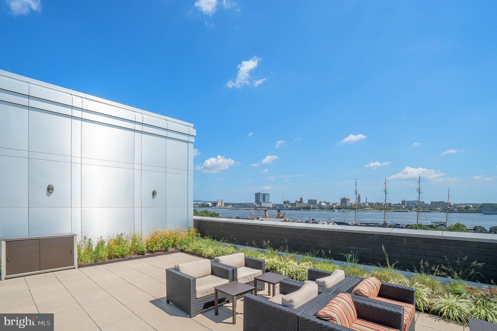 410 South Front Street, Unit 108 Philadelphia, PA 19147 - Photo 27 of 34 a view of a terrace with a couch
