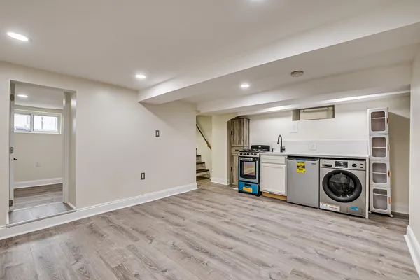 a view of a storage & utility room with washer and dryer