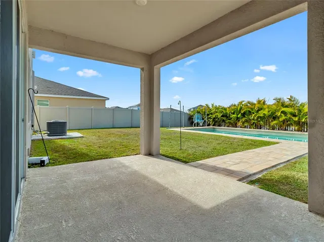 a view of a golf course with a lake