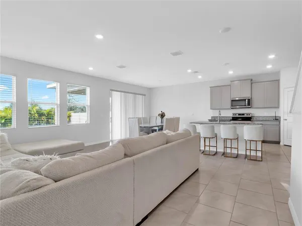 a bedroom with a bed and hallway