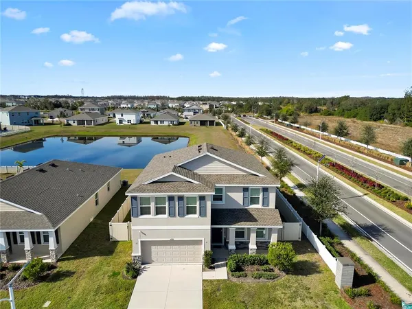 a aerial view of a house with a ocean view