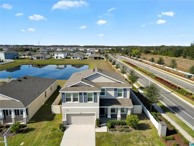 a aerial view of a house with a ocean view