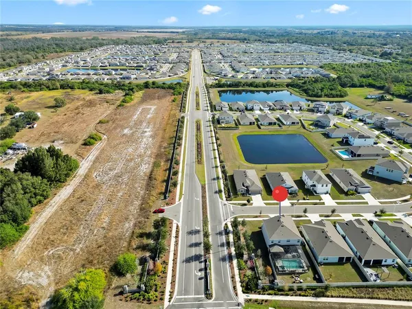an aerial view of a swimming pool and outdoor space