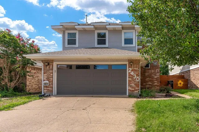 front view of a house with a garage