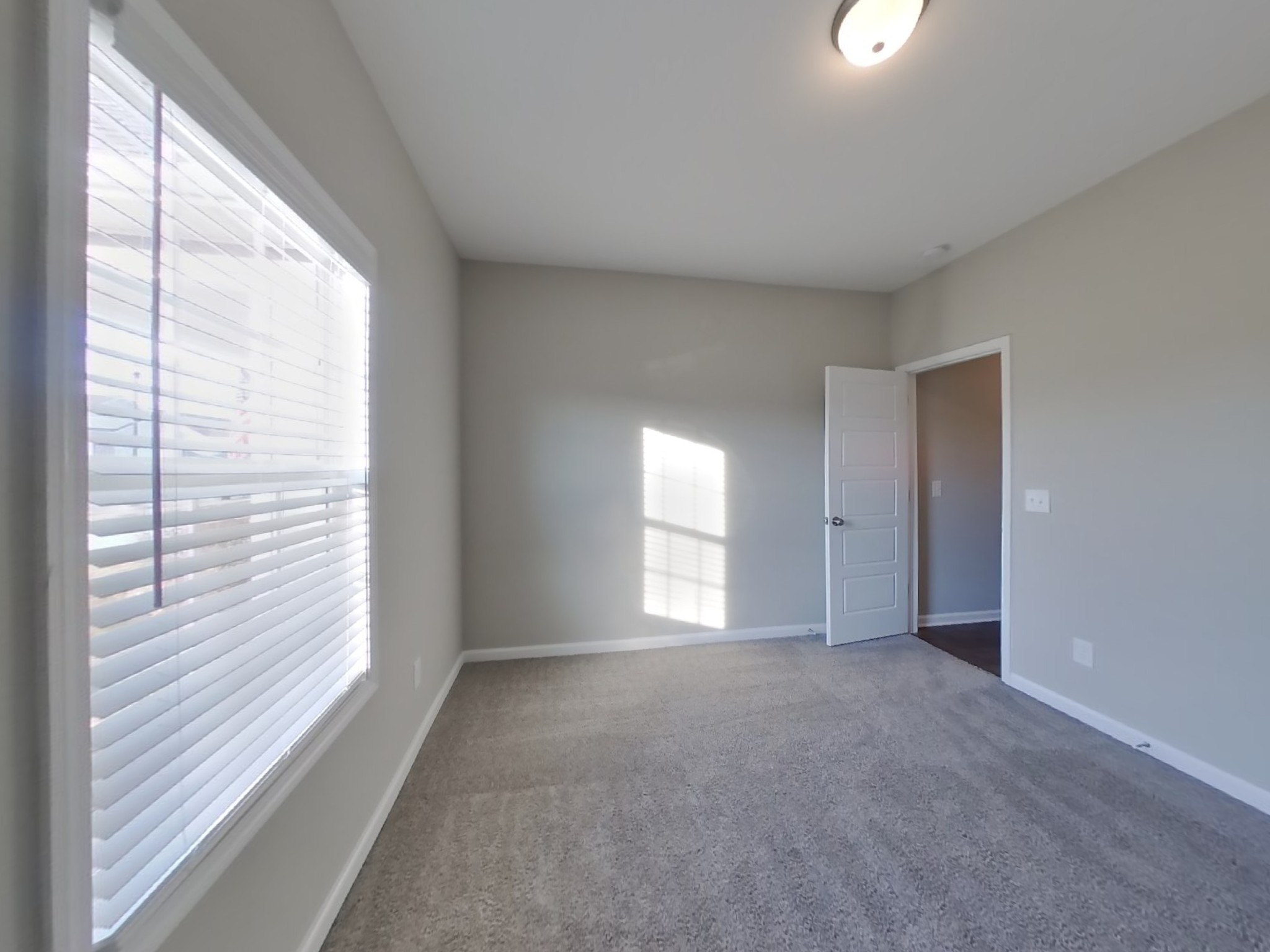 815 Ellyson Drive Spring Hill, TN 37174 - Photo 12 of 16 a view of an empty room with a window