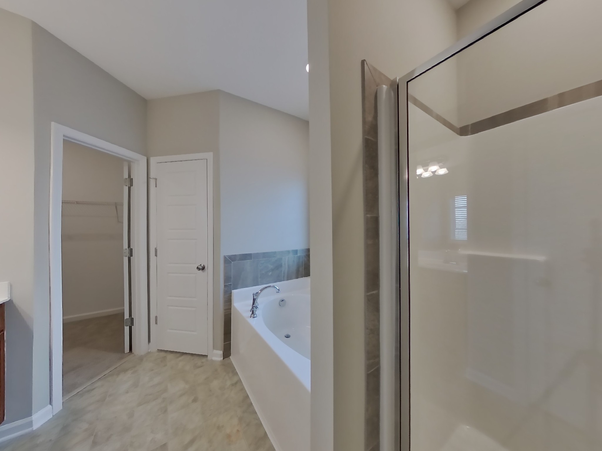 815 Ellyson Drive Spring Hill, TN 37174 - Photo 10 of 16 a bathroom with a bathtub and a shower