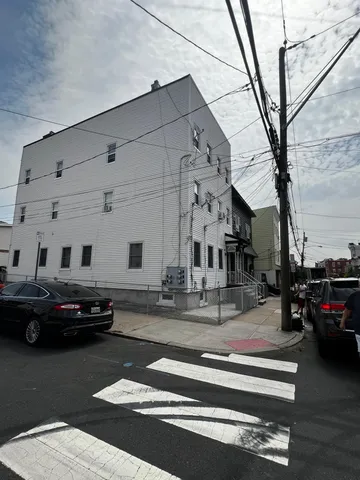 a car parked in front of a building