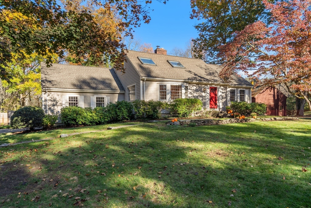 31 White Road Wayland, MA 01778 - Photo 1 of 36 a front view of house with yard and green space