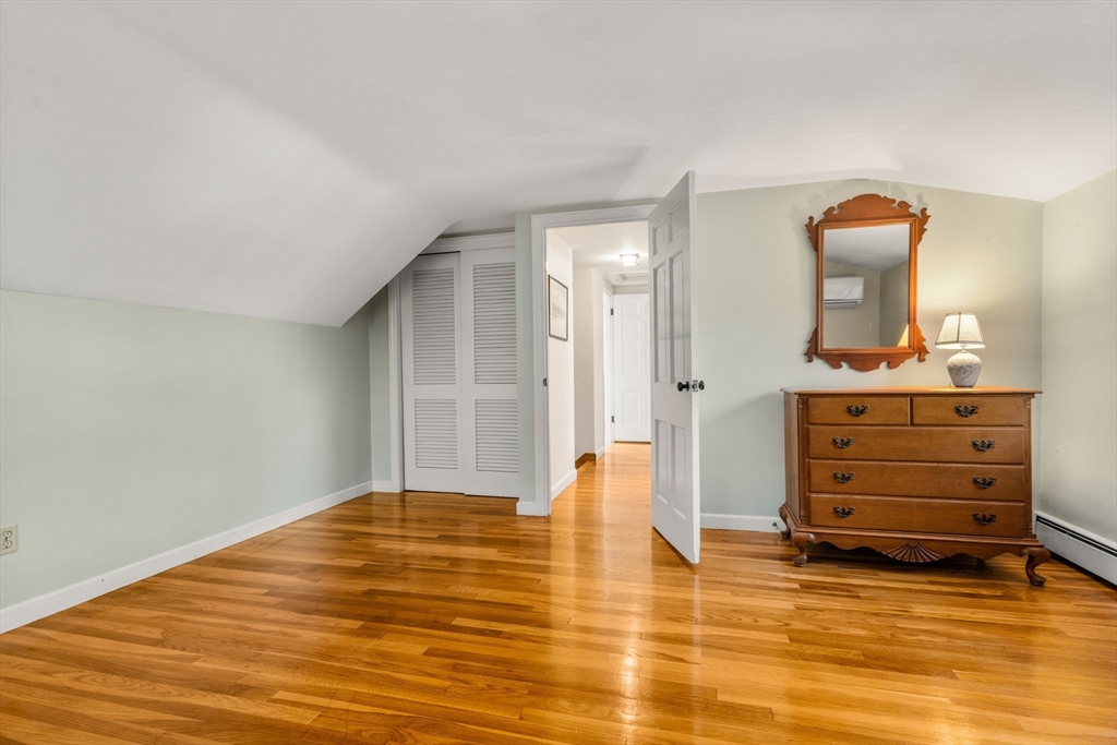 31 White Road Wayland, MA 01778 - Photo 20 of 36 a view of a room with wooden floor
