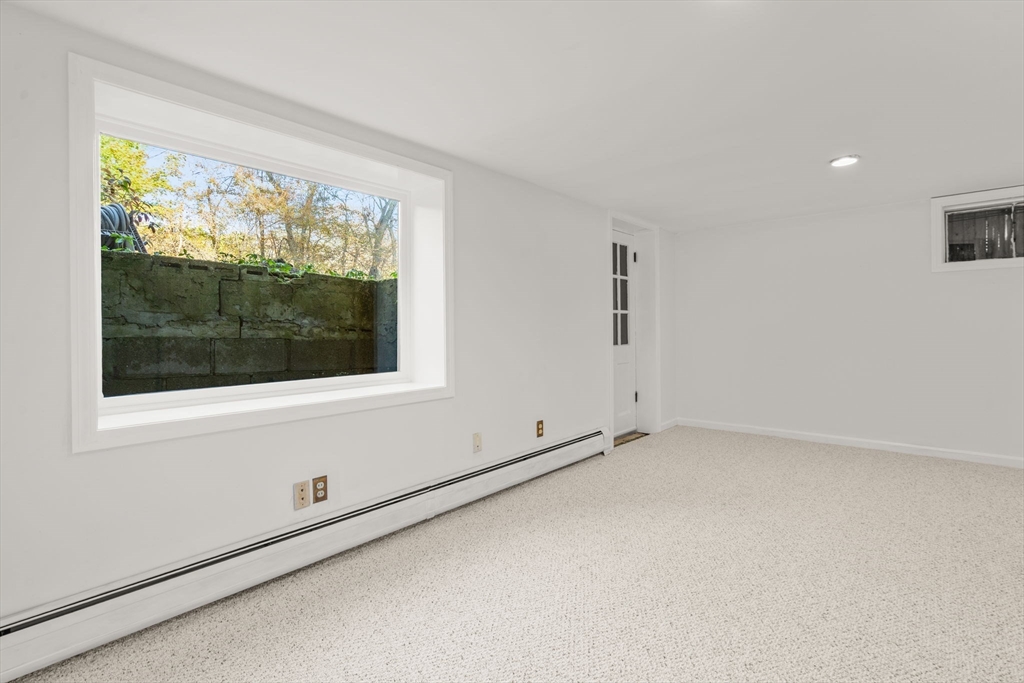 31 White Road Wayland, MA 01778 - Photo 33 of 36 a view of an empty room with a window