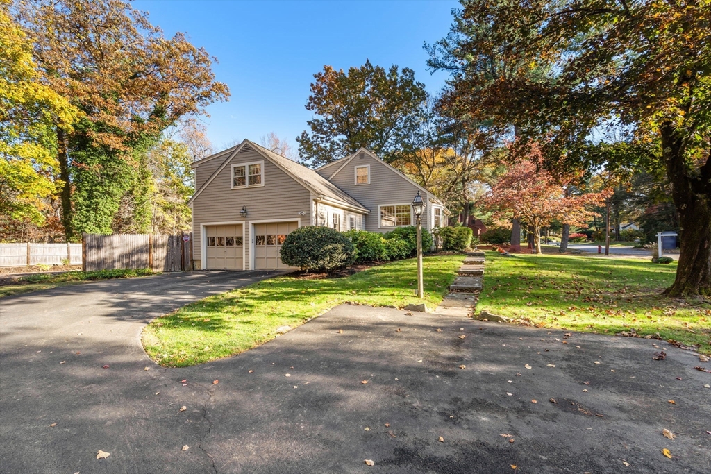 31 White Road Wayland, MA 01778 - Photo 34 of 36 a view of a house with a big yard and large trees