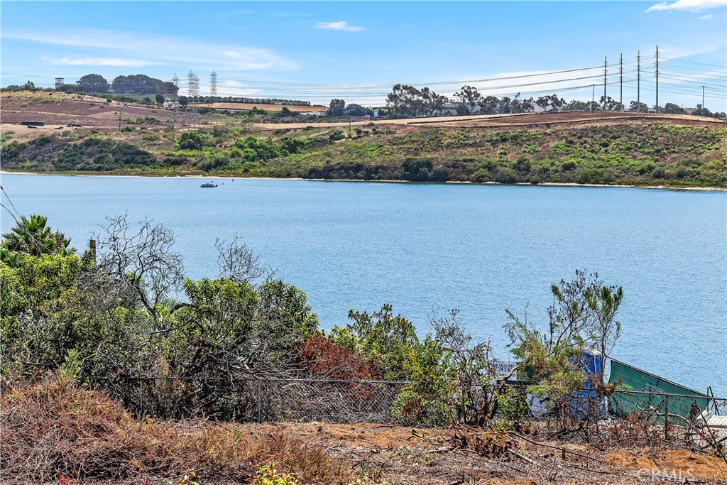 0 Adams Street Carlsbad, CA 92008 - Photo 13 of 23 a view of a lake with a city in the background