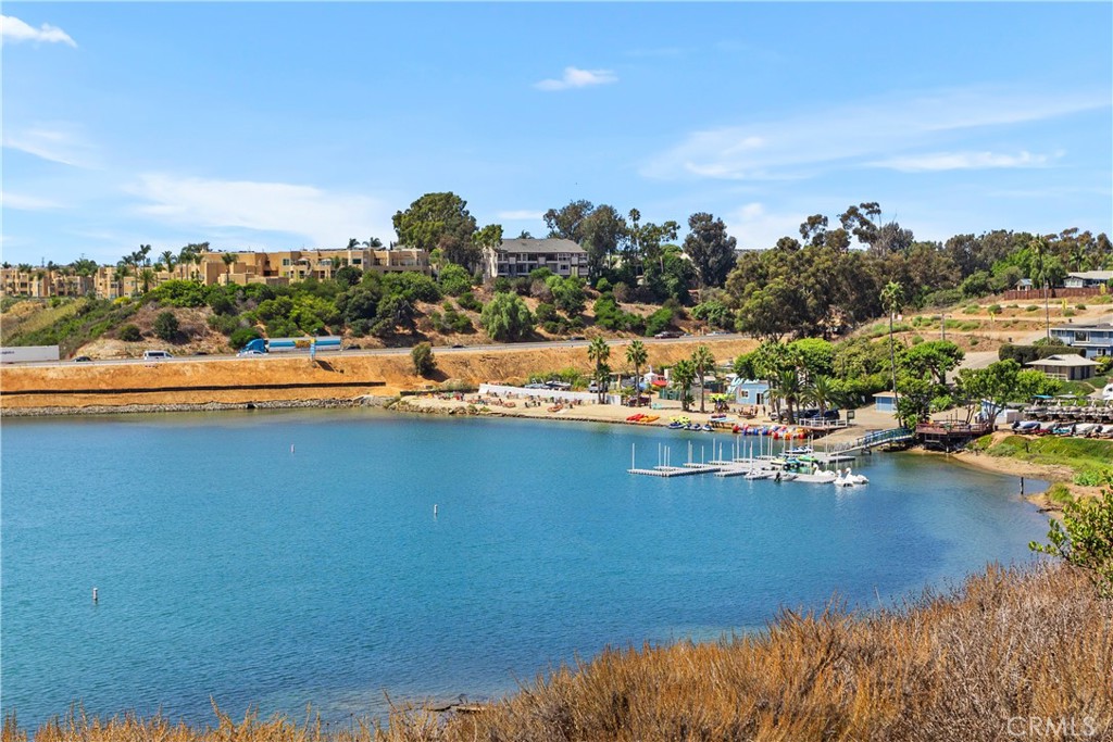 0 Adams Street Carlsbad, CA 92008 - Photo 23 of 23 a view of a lake with boats and trees in the background
