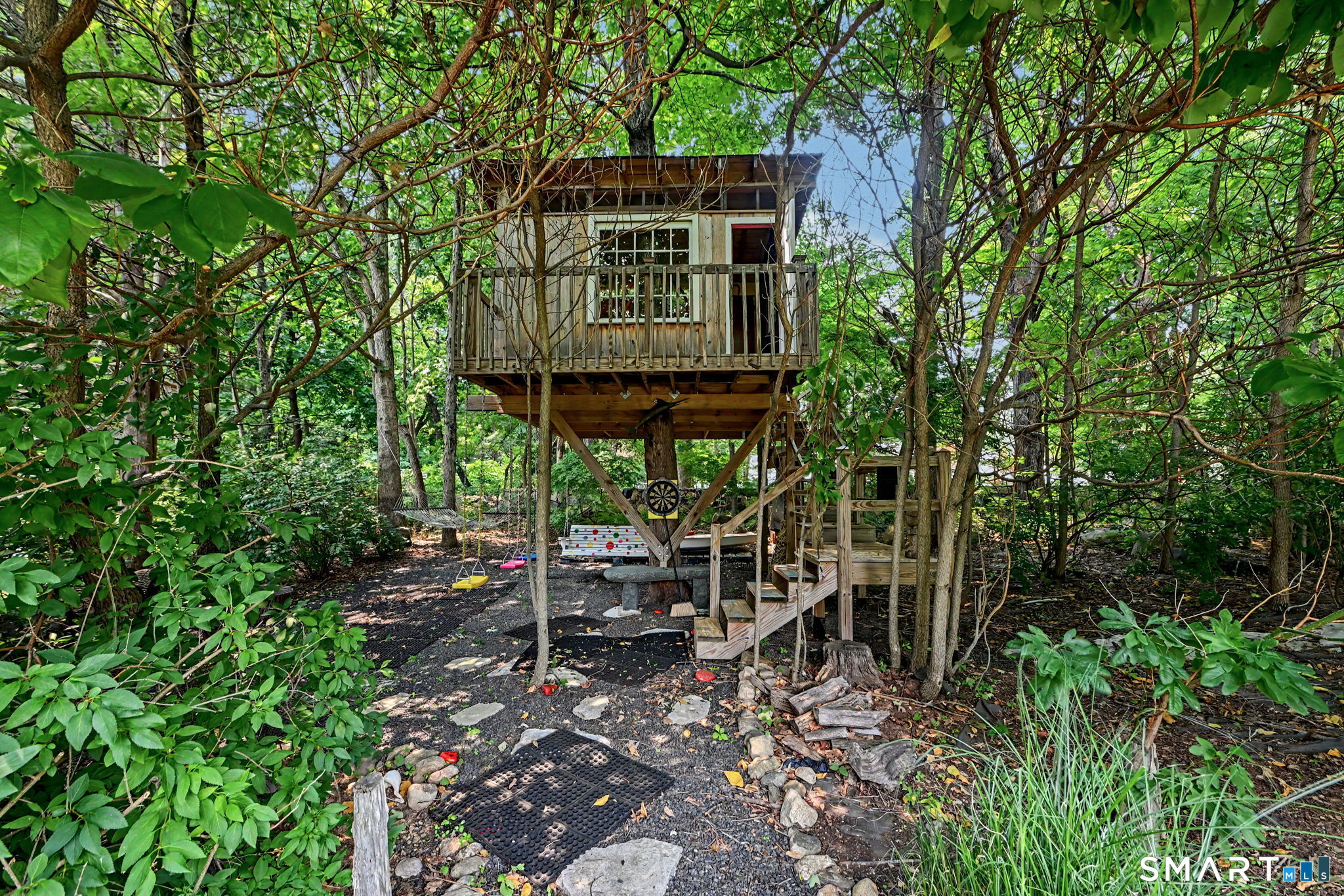 29 Old Logging Road Stamford, CT 06903 - Photo 35 of 38 Treehouse in the back yard, by the giant 600 year old clam shell