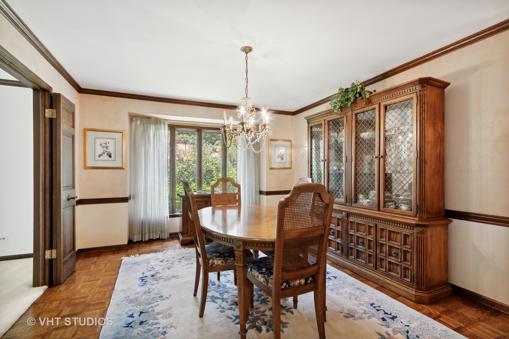 395 North Valley Road Barrington, IL 60010 - Photo 11 of 45 a dining room with furniture window wooden floor and a chandelier