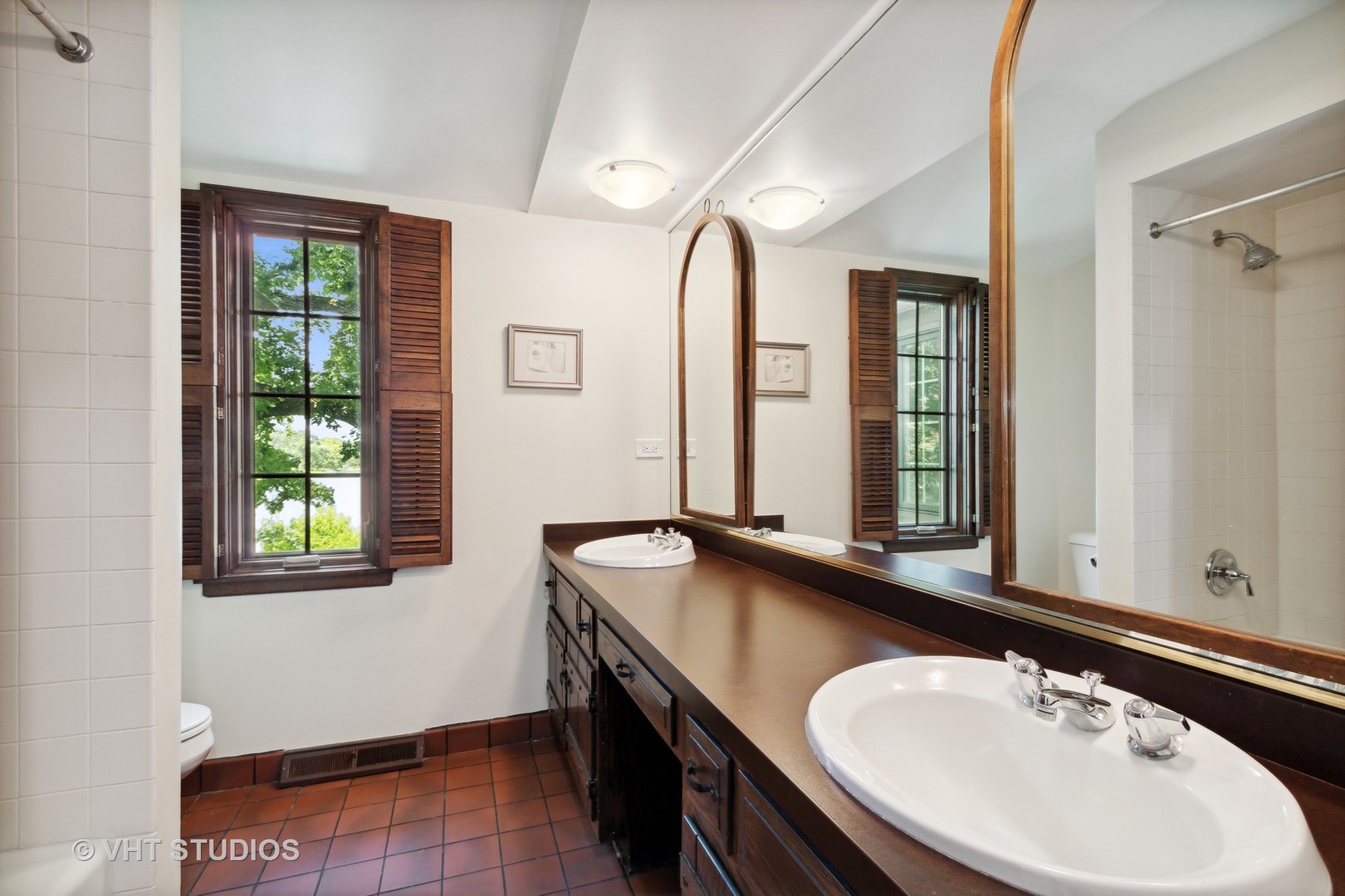 395 North Valley Road Barrington, IL 60010 - Photo 24 of 45 a bathroom with a sink and a window