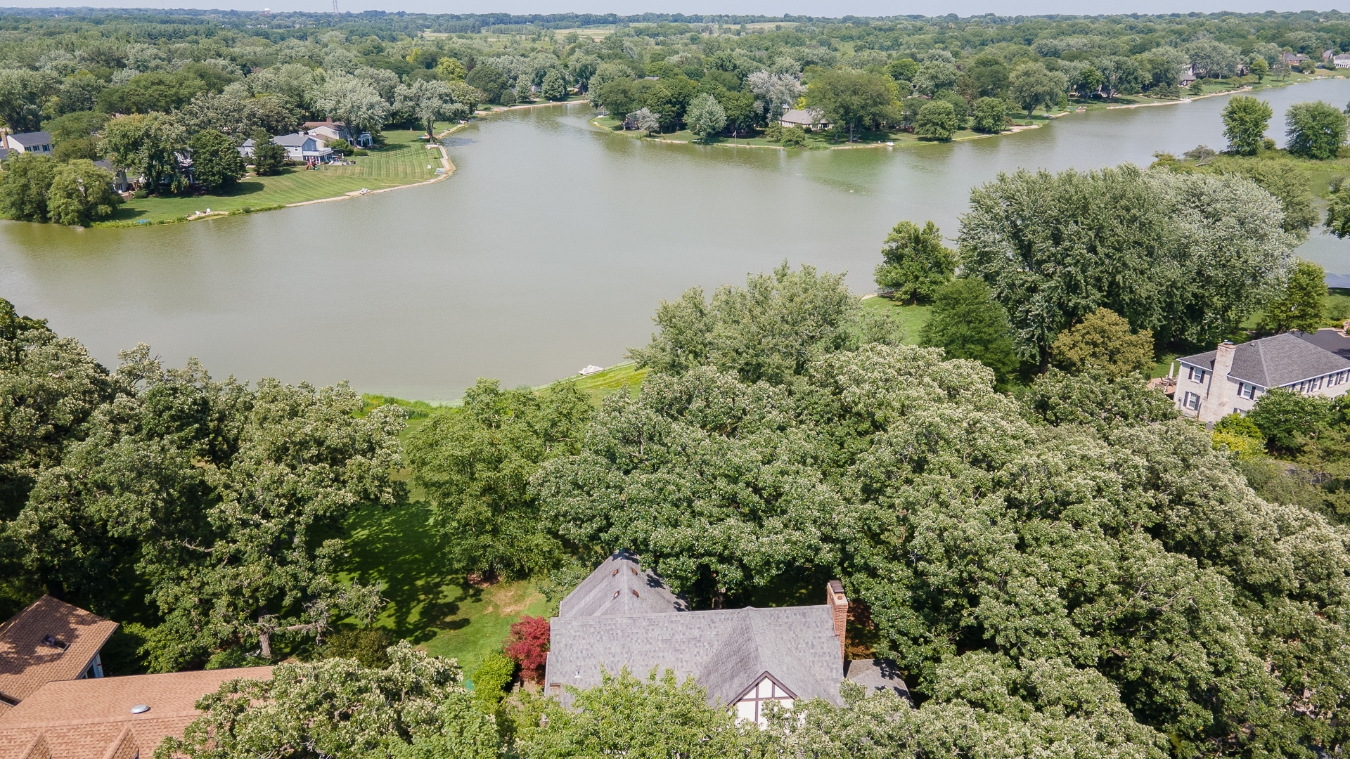 395 North Valley Road Barrington, IL 60010 - Photo 40 of 45 an aerial view of a house with a lake view