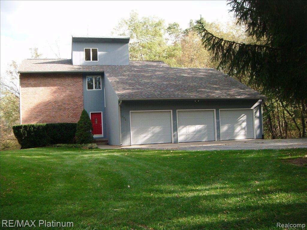 1775 Fox Ridge Drive Howell, MI 48843 - Photo 1 of 11 Summer picture of home