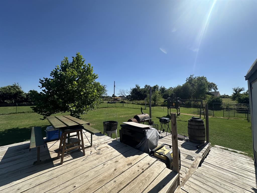 118 Rommel Court Springtown, TX 76082 - Photo 17 of 17 part of porch and back yard