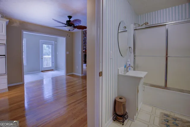 a view of an empty room with entertaining space