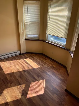 a view of hallway with windows