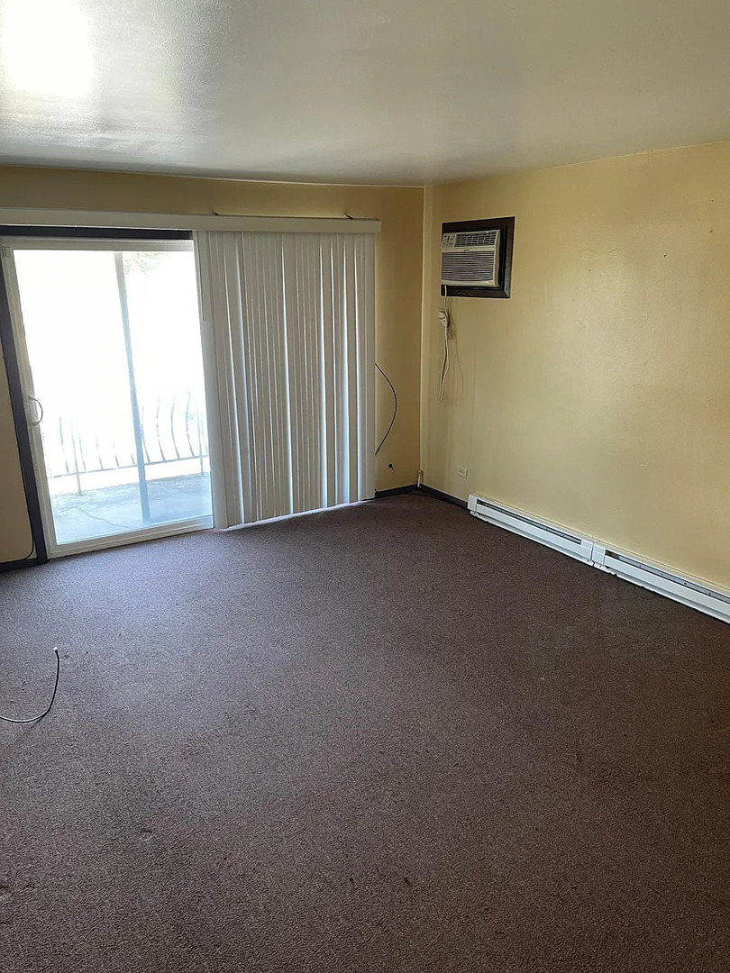 437 Prairie Avenue Calumet City, IL 60409 - Photo 15 of 15 a view of an empty room with a window