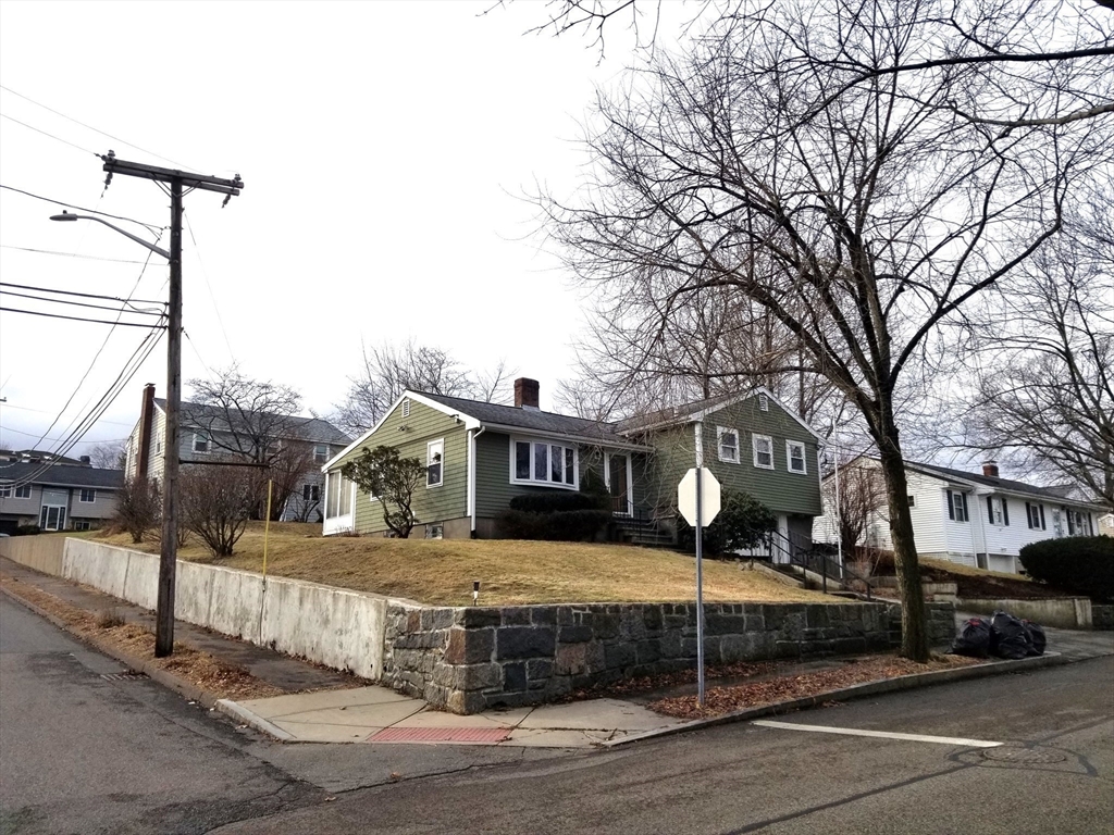 225 Governors Road, Unit 225 Quincy, MA 02169 - Photo 1 of 19 a front view of a building with parking space