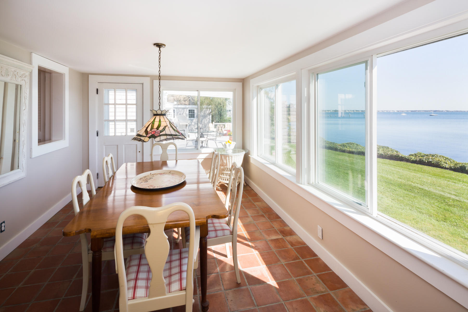 97 Harbor Bluff Road Hyannis, MA 02601 - Photo 16 of 33 a view of a dining room with furniture window and outside view