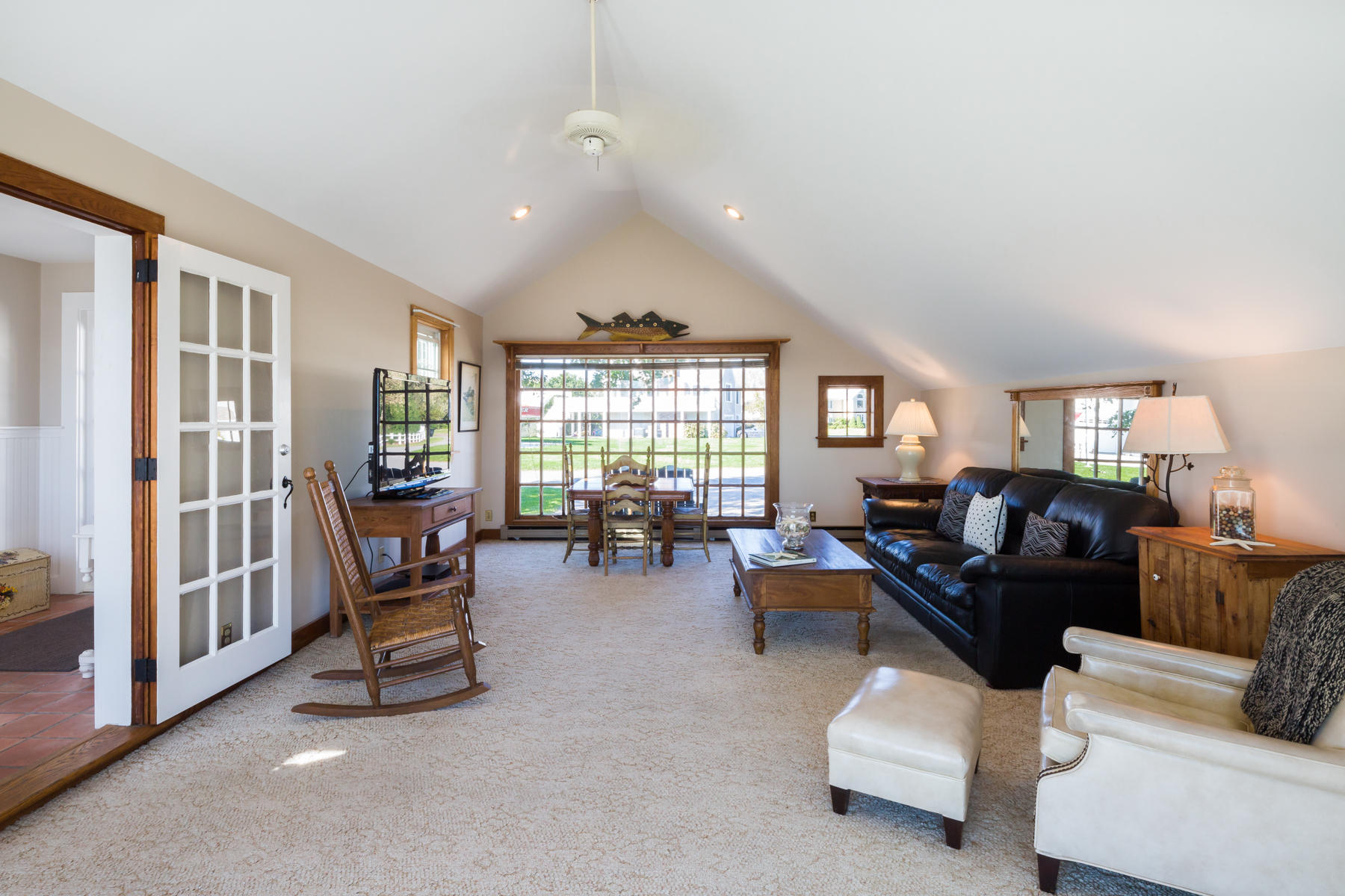 97 Harbor Bluff Road Hyannis, MA 02601 - Photo 22 of 33 a living room with furniture and a large window