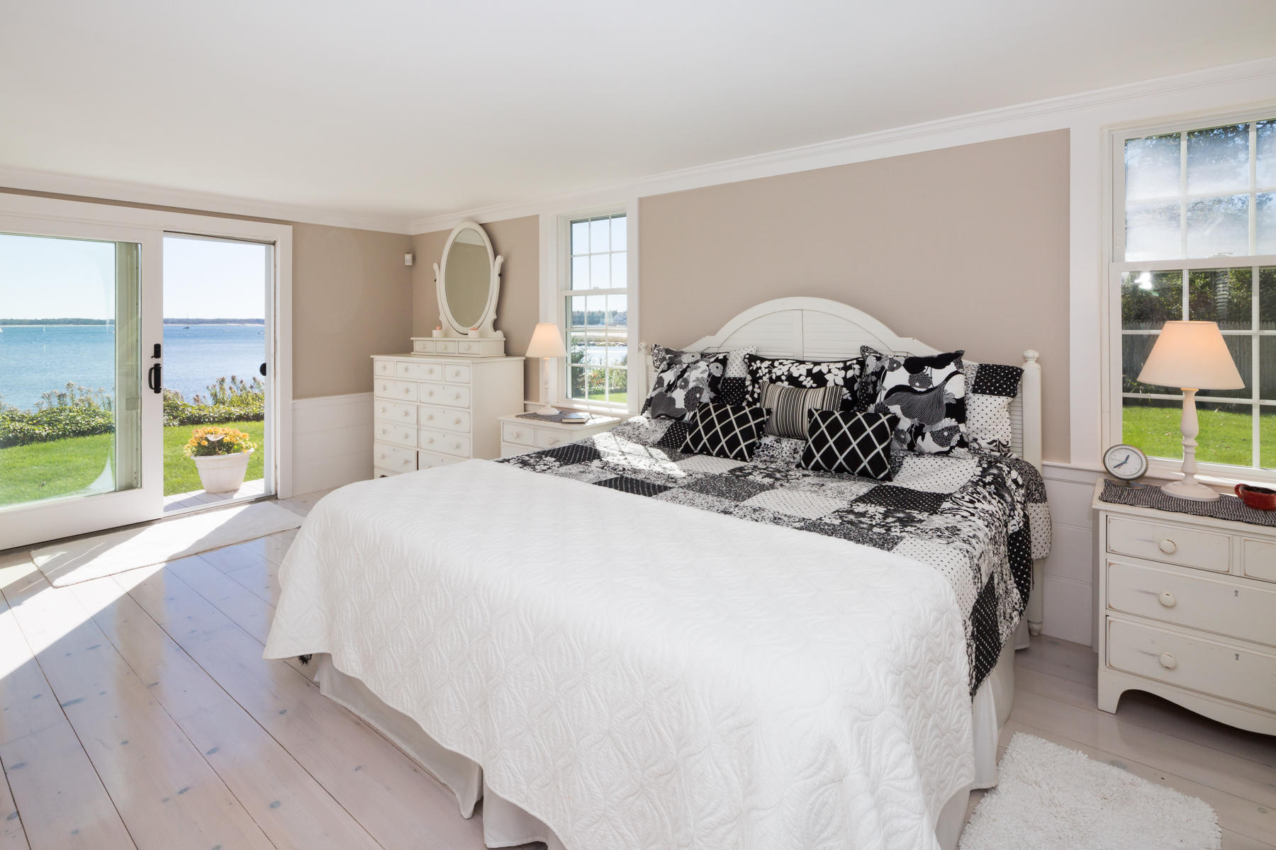 97 Harbor Bluff Road Hyannis, MA 02601 - Photo 24 of 33 a bedroom with a bed and a large window