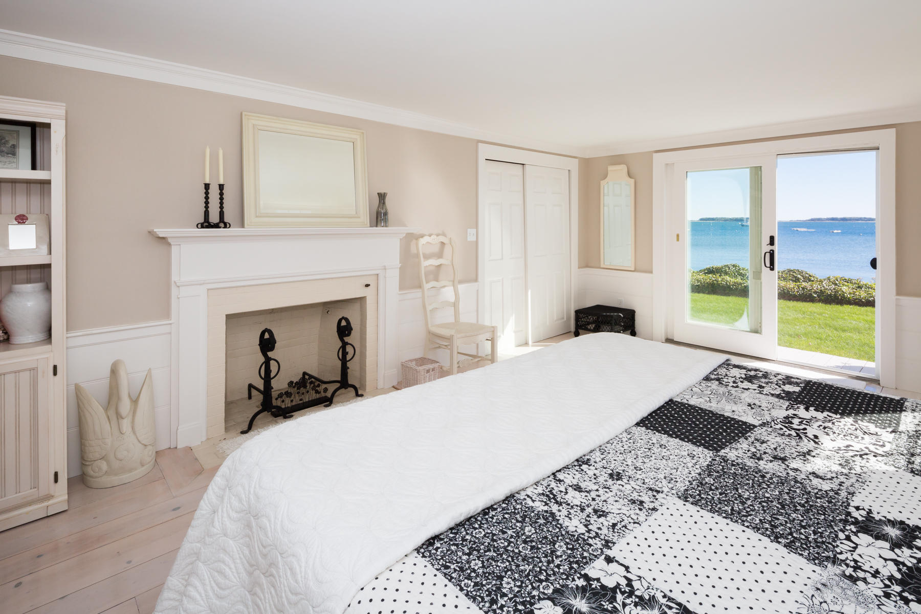 97 Harbor Bluff Road Hyannis, MA 02601 - Photo 25 of 33 a bedroom with a bed and a fireplace
