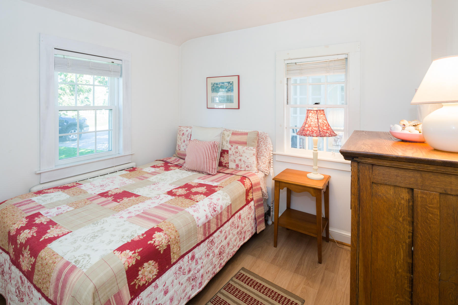 97 Harbor Bluff Road Hyannis, MA 02601 - Photo 27 of 33 a bedroom with a bed and a window