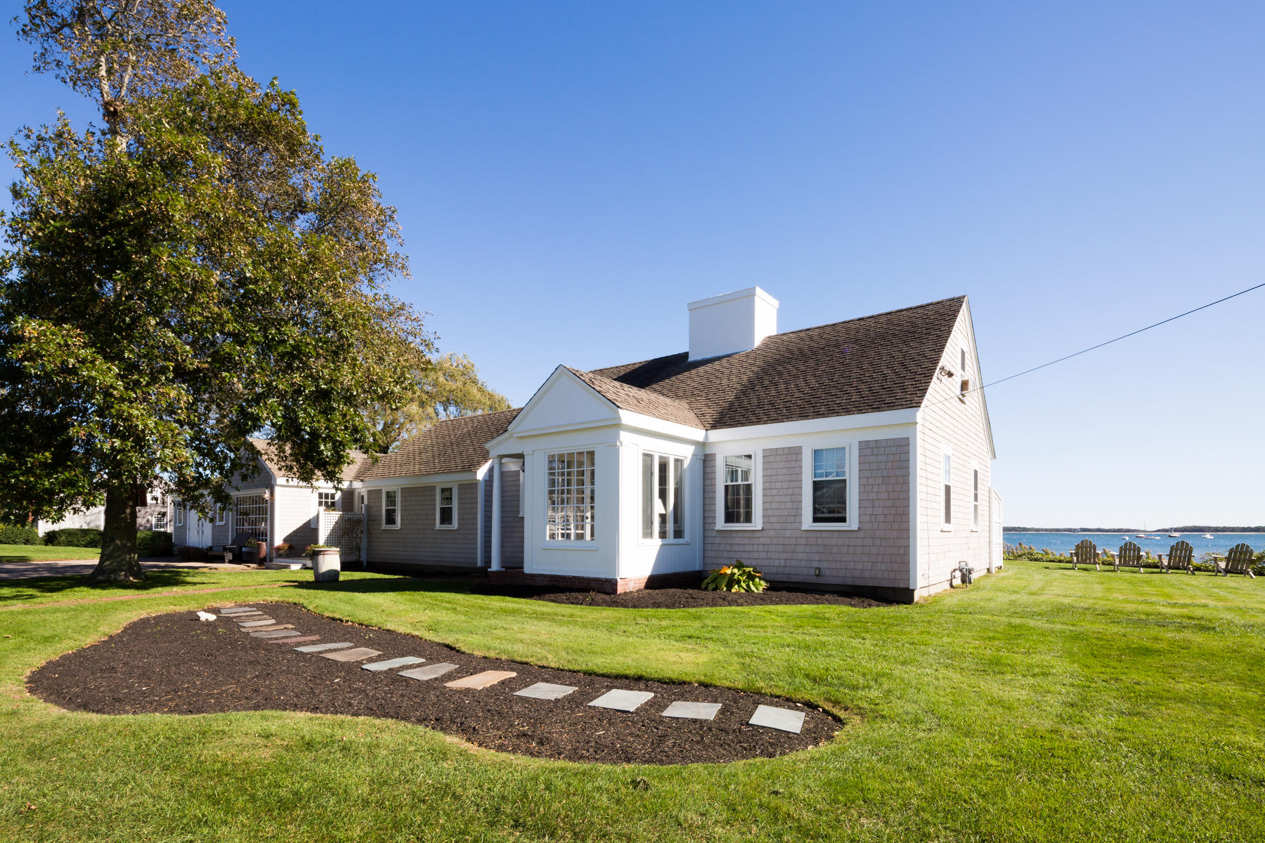 97 Harbor Bluff Road Hyannis, MA 02601 - Photo 3 of 33 a view of a house with a backyard
