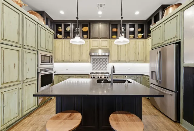a living room with furniture fireplace and flat screen tv