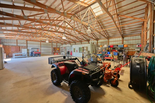 a view of grassy field with trees