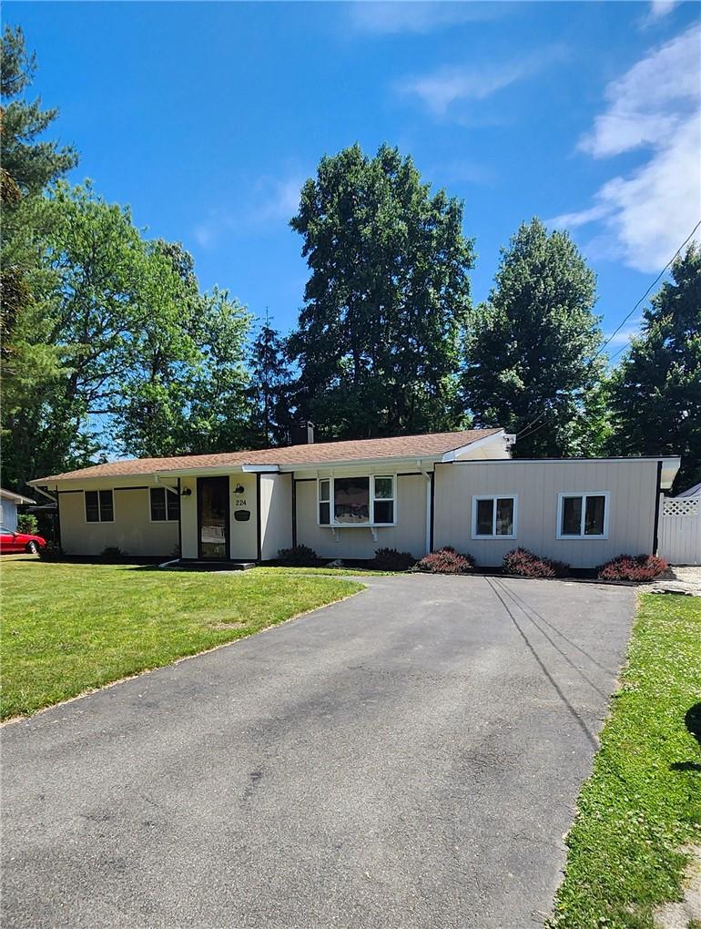 224 Whalesback Road Red Hook, NY 12571 - Photo 1 of 1 a front view of a house with yard and trees