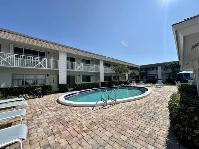 a view of a house with swimming pool