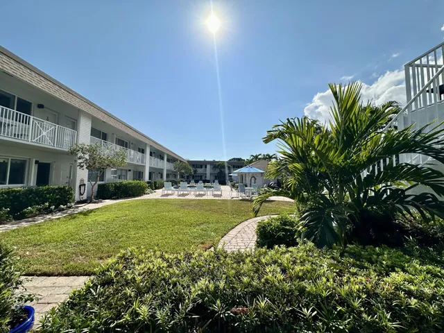 a view of a back yard of the house
